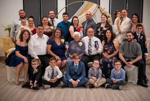 Grandma Noelia surrounded by her grandchildren