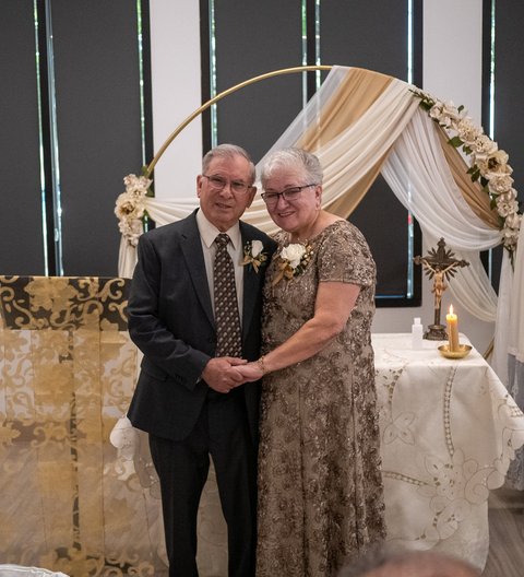 Joe and Leonilda standing