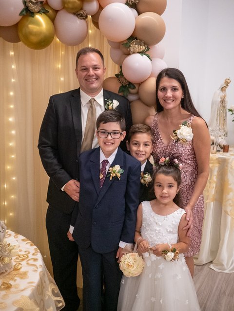 The Martins family standing